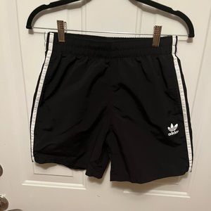 Men’s Adidas 3 stripe Mesh lined Swim Shorts. Mid rise